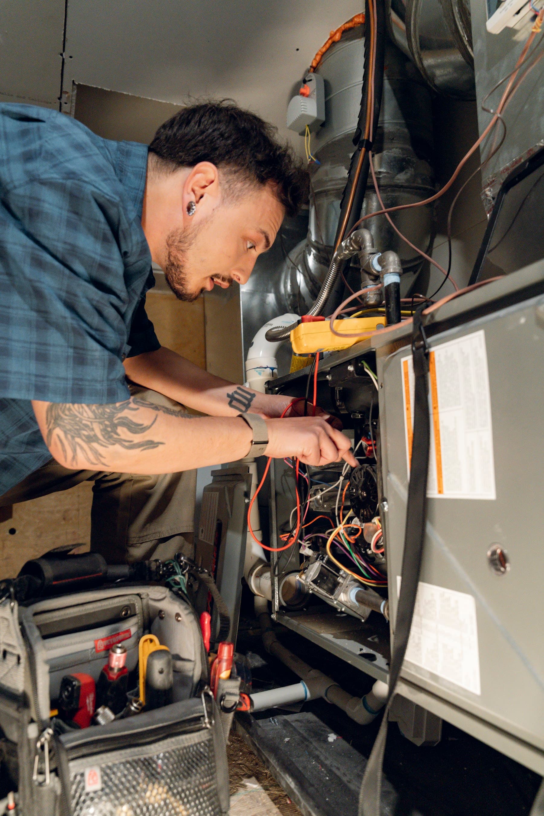Eagle Heating and Air technician diagnosing an urgent furnace repair